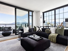 Interior designer Aleem Kassam's signature use of black in the furnishings, warmed by earthy-hued accessories, makes a dramatic statement against the backdrop of stunning city views.