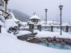 A trio swimming in the Grand Hotel and Conference Centre pool at Sun Peaks Resort. Destination BC/Reuben Krabbe