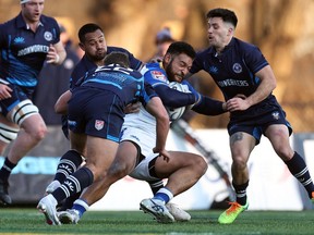 Rugby New York makes a tackle in the second half against the Toronto Arrows at Memorial Field on February 26, 2023 in New York. The Arrows' ownership have battled through the pandemic and kept the doors open, but at great expense.