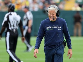 GREEN BAY, WISCONSIN - AUGUST 26: Head coach Pete Carroll of the Seattle Seahawks watches action during the second half of a preseason game against the Green Bay Packers at Lambeau Field on August 26, 2023 in Green Bay, Wisconsin.