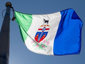 The Yukon provincial flag flies on a flag pole in Ottawa. The territory topped the list in a study of healthy regions of Canada.