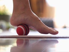 Myofascial release of hyper-movable muscles of foot with massage ball