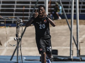 Canada's Jonathan David celebrates scoring against Jamaica in first-half injury time at Independence Stadium in Kingston, Jamaica, on Saturday.
