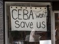 A small business in Toronto with a sign about CEBA in its window in 2020.