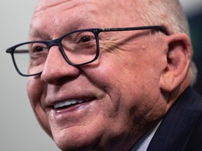 Vancouver Canucks President of Hockey Operations and Interim General Manager Jim Rutherford smiles during his first news conference since being hired by the NHL hockey team, in Vancouver, on Monday, December 13, 2021.