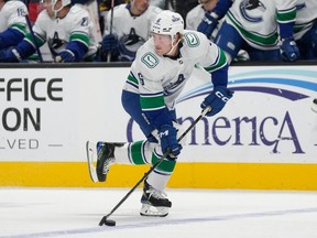 Vancouver Canucks right wing Brock Boeser skates with the puck against the San Jose Sharks during the first period of an NHL hockey game in San Jose, Calif., Thursday, Nov. 2, 2023.