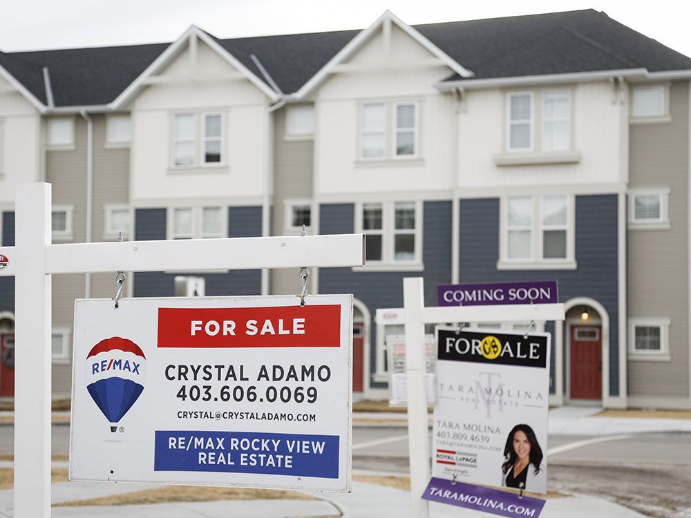 Canada home prices slide as homebuyers go into 'hibernation