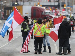 Convoy protest participants gather on a downtown Ottawa street on Feb. 9, 2022.
