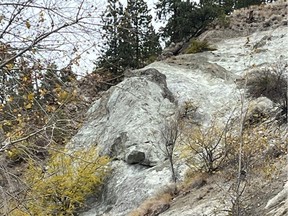 A photo posted by the City of Penticton on social media shows the rock with a large crack on a slope near the evacuated properties.