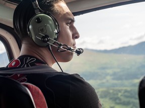 President of the Tahltan Central Government Chad Norman Day surveys Tahltan territory by helicopter in this July 2019 handout photo. A new agreement between the province and an Indigenous government in northern British Columbia is being heralded as historic for requiring the nation's consent ahead of any significant changes at a major mine.