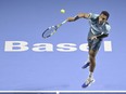 Montreal's Felix Auger-Aliassime had his six-match winning streak ended Wednesday with a 6-3, 7-6 (4) loss to seventh seed Stefanos Tsitsipas in second-round action at the Paris Masters tennis tournament. Auger-Aliassime serves a ball to Denmark's Holger Rune during their semifinal match at the Swiss Indoors tennis tournament in Basel, Switzerland, on Saturday, Oct. 28, 2023.