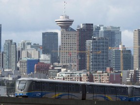 Metro Vancouver mayors say they need billions of dollars over the next few years and a more reliable funding model from federal government in order to improve transit for the area. A sky train is pictured in downtown Vancouver, Saturday, March 14, 2015.THE CANADIAN PRESS/Jonathan Hayward