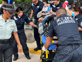 A photo of Samy Tamouro being taken away on a stretcher by first responders after he was shot at a gym in Mexico on Dec. 13, 2023. Tamouro had ties to the Hells Angels in Quebec.