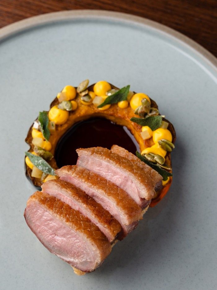 Seared Duck Breast with Roasted Acorn Squash. 