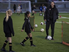 Canadian Women’s National Soccer Team player Christine Sinclair has some fun running drills for girls from Burnaby FC on Saturday, outside the community centre bearing her name. She will play her final game for Canada on Tuesday.