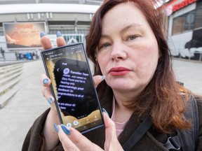 VANCOUVER, BC - December 12, 2023 - Sarah Blyth-Gerszak holds her phone with photo she took of a Parks Board Commissioner's phone. Vancouver, BC, December 12, 2023. (Arlen Redekop / Postmedia staff photo) (Story by Dan Fumano) [PNG Merlin Archive]