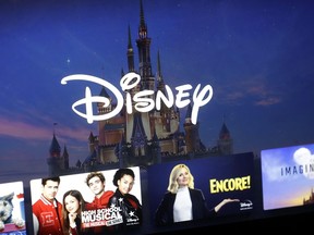 A Disney logo forms part of a menu for the Disney Plus streaming service on a computer screen in Walpole, Mass., on Nov. 13, 2019.