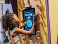 Photo of little girl at science exhibition