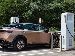 A Nissan Ariya charges up at a Level 3 public charger, the fastest of the three levels available in Canada.