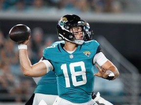 Nathan Rourke throws a pass for the Jacksonville Jaguars against the Miami Dolphins during the second half at TIAA Bank Field on Aug. 26 in Jacksonville, Fla.
