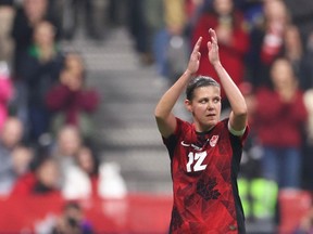 Christine Sinclair acknowledges fans as she leaves the field during the second half against Australia at B.C. Place on Dec. 5.