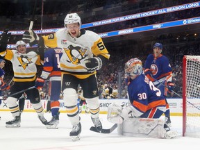 Jake Guentzel of the Pittsburgh Penguins scores a goal against Ilya Sorokin of the New York Islanders last month. The Pens won 7-0.