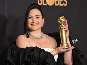 US actress Lily Gladstone poses with the award for Best Performance by a Female Actor in a Motion Picture - Drama for "Killers of the Flower Moon" in the press room during the 81st annual Golden Globe Awards at The Beverly Hilton hotel in Beverly Hills, California, on January 7, 2024.