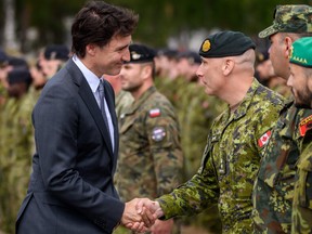 Prime Minister Justin Trudeau meets the Canada-led multinational NATO enhanced Forward Presence Battle Group in the Adazi military base in Riga, Latvia, on July 10, 2023. (Photo by Gints Ivuskans / AFP) (Photo by GINTS IVUSKANS/AFP via Getty Images)
