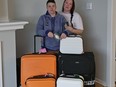 Meagan Watson, left, and her wife Mindy are seen in a undated handout photo with their luggage.