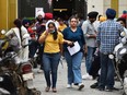 Candidates leave after appearing for an International English Language Testing System (IELTS) examination in Amritsar, India, in 2022.