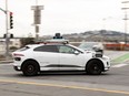 An autonomous Waymo Jaguar I-Pace on Cesar Chavez Street in San Francisco, Nov. 17, 2023.
