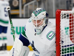 BOSTON, MASSACHUSETTS - FEBRUARY 08: Thatcher Demko #35 of the Vancouver Canucks warms up prior to a game against the Boston Bruins at the TD Garden on February 8, 2024 in Boston, Massachusetts.