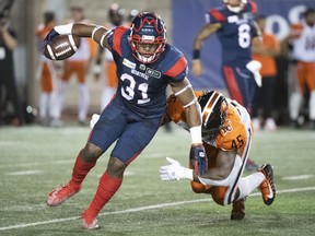 Montreal Alouettes running back William Stanback (31) breaks away against the B.C. Lions in 2021. The downhill running back is now a member of the Leos after signing on Tuesday.