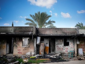 Destroyed houses are seen in Kibbutz Kfar Aza following Hamas's Oct. 7 massacre.