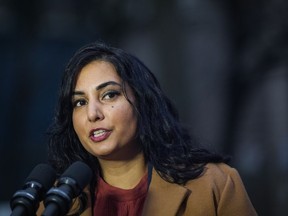 B.C. Attorney General Niki Sharma responds to questions outside B.C. Supreme Court in Vancouver on Monday November 27, 2023. British Columbia's attorney general is set to formally apologize to children who were removed from their homes more than 70 years ago, largely due to their families' religious and political beliefs.
