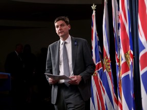 Premier David Eby arrives for a press conference at the legislature in Victoria, B.C., on Thursday, Oct. 5, 2023. Eby officially apologized in the Victoria legislature on behalf of government to members of the Doukhobor religious community, including children who were forcibly taken from their parents more than 70 years ago.