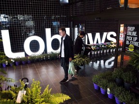 Loblaw Cos. Ltd. says it will build more than 40 new stores as part of a record investment plan of more than $ 2 billion.&ampnbsp;A man leaves a Loblaws store in Toronto on Thursday, May 3, 2018.