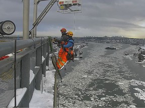 Technicians prepare chain collars to remove ice and snow from B.C. bridges.