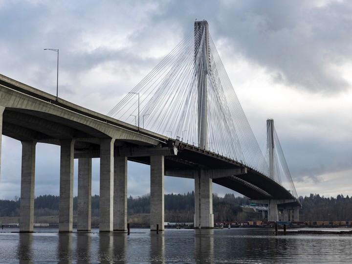  The Port Mann Bridge spans the Fraser River to connect Coquitlam and Surrey. The original Port Mann bridge opened in 1964 and was replaced by a 10-lane cable-stayed bridge in 2012.