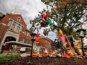 A makeshift memorial is seen outside the former Kamloops Indian Residential School in Kamloops, B.C., after the possible discovery of 215 unmarked graves on the property in May 2021.