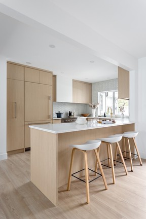 The kitchen is a highly functional cooking space for the home's six inhabitants.