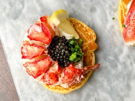 Blini with crème fraîche, lobster meat and sturgeon caviar from B.C.'s own Divine Caviar.