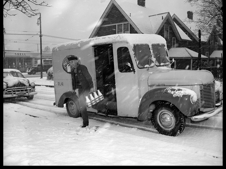  Dairyland milkman delivering in a snowstorm. Art Jones, Artray/ Vancouver Public Library collection VPL: 81514C