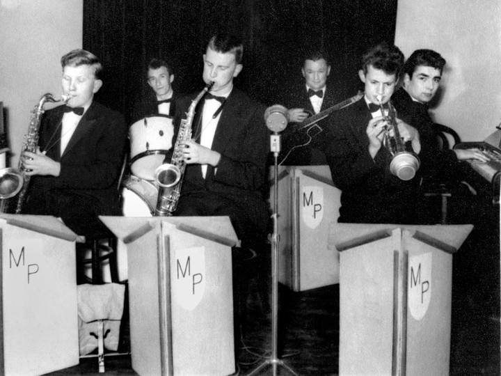  An 18-year-old Malcolm Parry playing saxophone with his band in England.