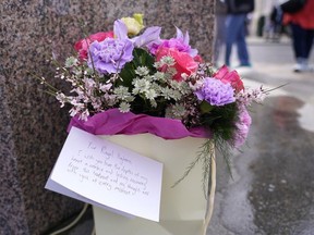 Flowers and a letter to the Princess of Wales were left outside Windsor Castle in Windsor, England, Saturday, March 23, 2024. Britain's Kate, Princess of Wales's revelation she is undergoing treatment for cancer has sparked an outpouring of support and well wishes from around the world.