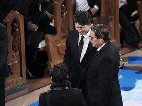 Prime minister Justin Trudeau and Canadian businessman Pierre Karl Péladeau arrive at the funeral of former prime minister Brian Mulroney, in Montreal, Saturday, March 23, 2024.
