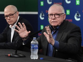 Vancouver Canucks president of hockey operations Jim Rutherford, right, and general manager Patrik Allvin have become a dynamic duo to reshape the team's roster.