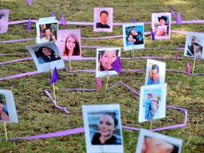 Photos on display of people who have died during the B.C. opioid crisis.