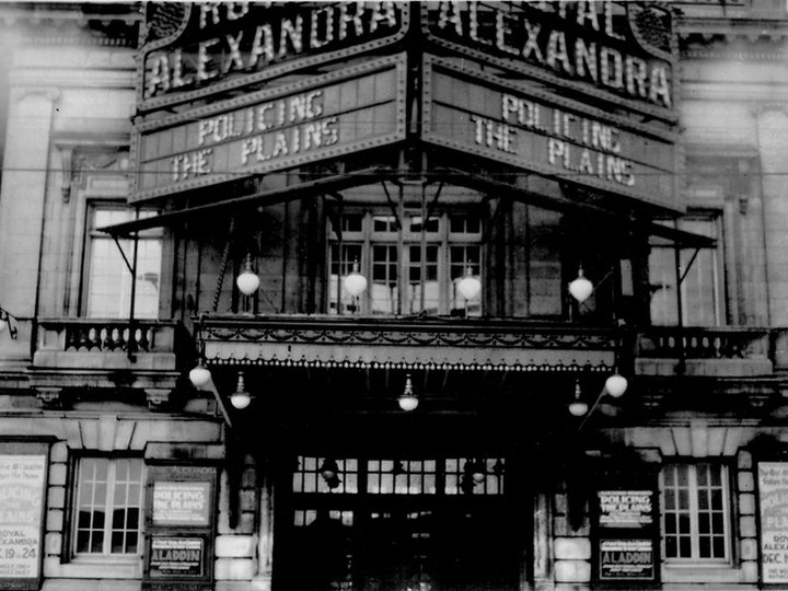  Facade and marquee of the Royal Alexandra Theatre, Toronto, advertising the premiere of A.D. Kean’s feature film Policing the Plains, December 1927. BC Archives H-01471