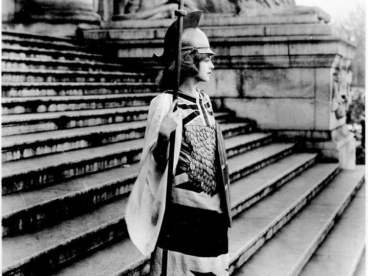  Miss Margaret Lougheed as Britannia in the opening scene of Cowboy Kean’s film Policing the Plains, May 1924. This scene was filmed at the provincial courthouse, which is now the Vancouver Art Gallery. BC Archives H-01225